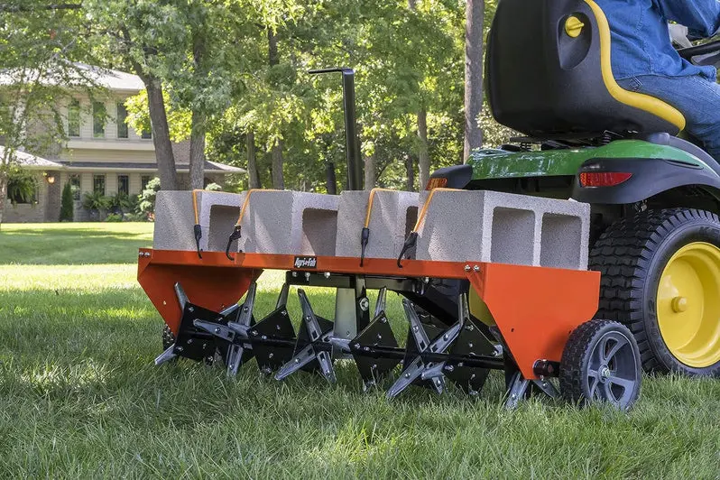 48-Inch Tow Plug Aerator – Heavy-Duty Lawn and Turf Aeration Tool in Orange and Black
