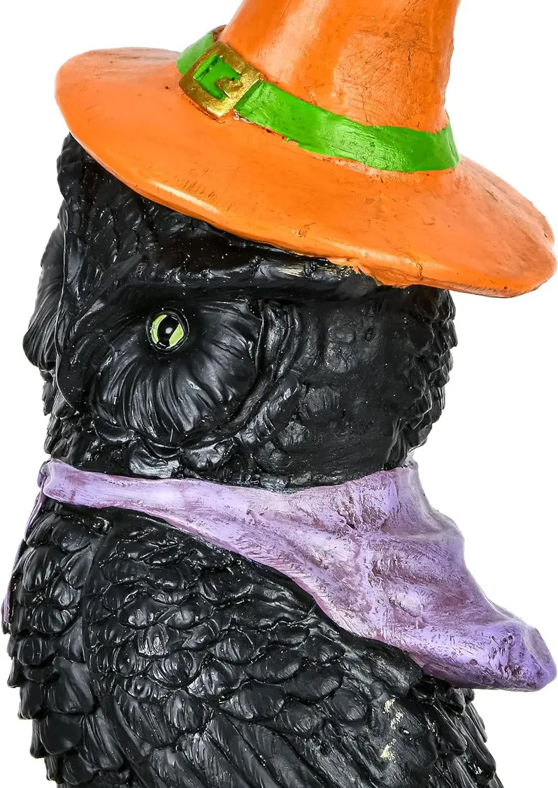 Halloween-Themed Owl Statue Perched on Stack of Books
