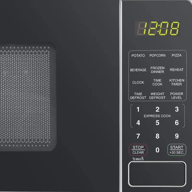 Mainstays 0.7 Cu. Ft. Countertop Microwave Oven – 700W, Compact White Design