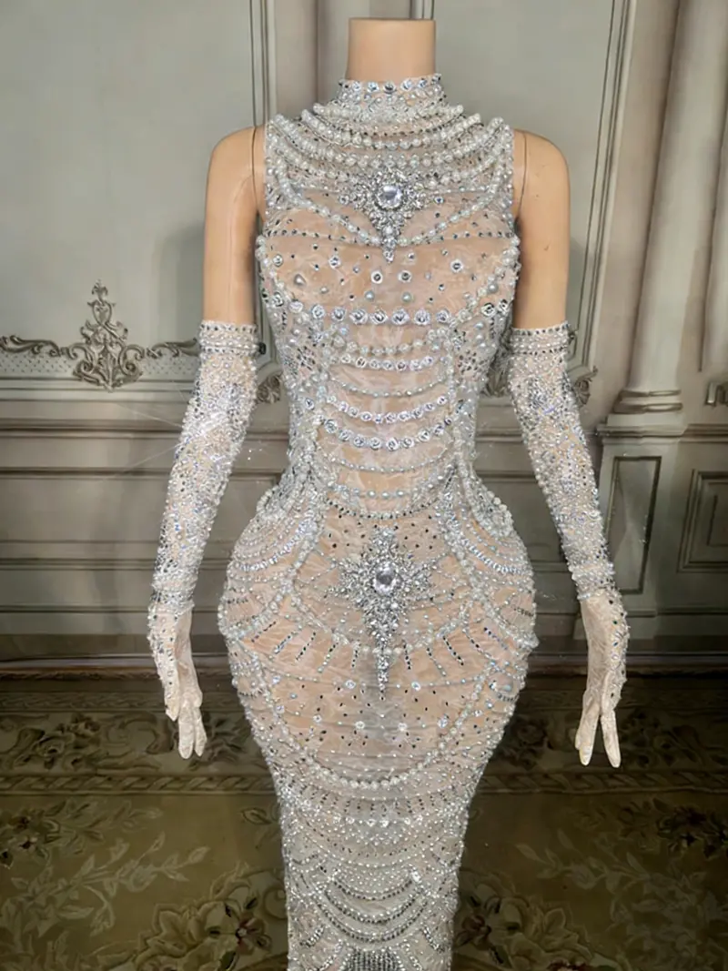 White Beaded Mermaid Gown – High-Neck Sleeveless Design with Dramatic Open Back & Floor-Sweeping Hem 4
